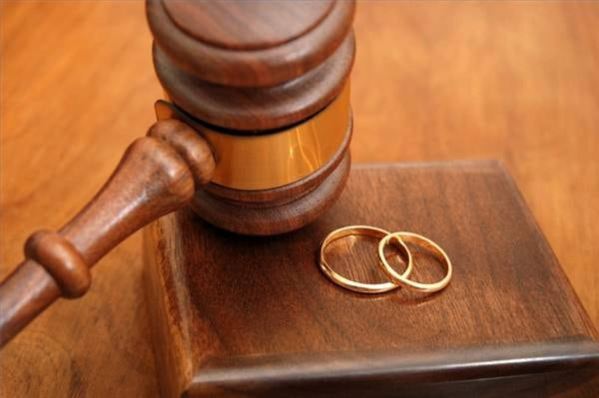 A judges hammer and two wedding rings